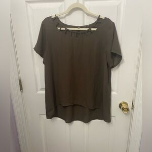 Olive Green Blouse with cutout neckline.